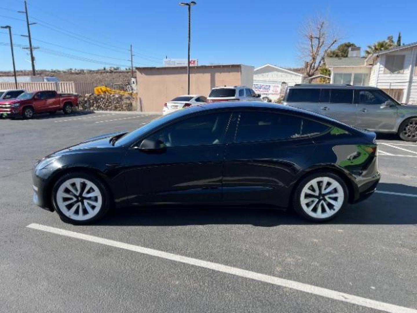 2021 Solid Black /Black Tesla Model 3 Long Range Dual Motor All-Wheel Drive (5YJ3E1EB1MF) , located at 1865 East Red Hills Pkwy, St. George, 84770, (435) 628-0023, 37.120850, -113.543640 - ****Price includes $4k IRS EV REBATE**** We are setup with IRS to file the rebate directly and take credit off the price of car. Check with IRS EV website to be sure you qualify. Trump has threatened to end rebate so ACT FAST! 2021 Tesla Model 3 Long Range AWD with 91,847 miles. Powered by a dual- - Photo#3